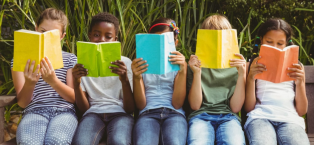 photo of a group of children reading