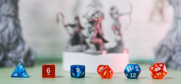 photo of dungeons and dragons board and dice