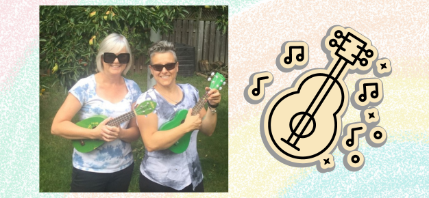 photo of two women with ukeleles