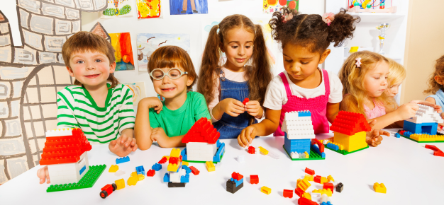 photo of a group of children making crafts