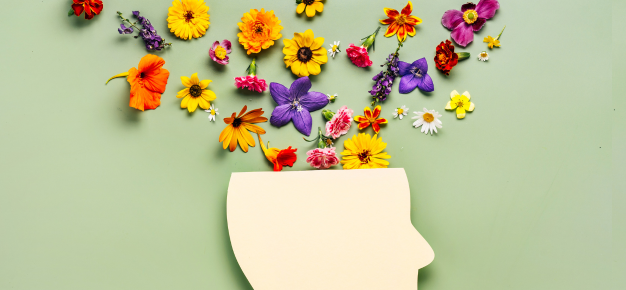 image of flowers sprouting from a person's head